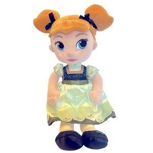 Soft Plush Doll Features Young Anna from Frozen Wearing a Green Dress by Disney.